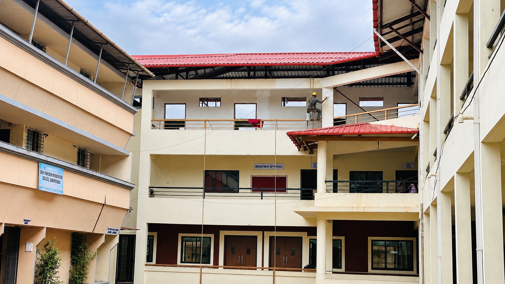 SPK College Building Courtyard with Red Roof Trim